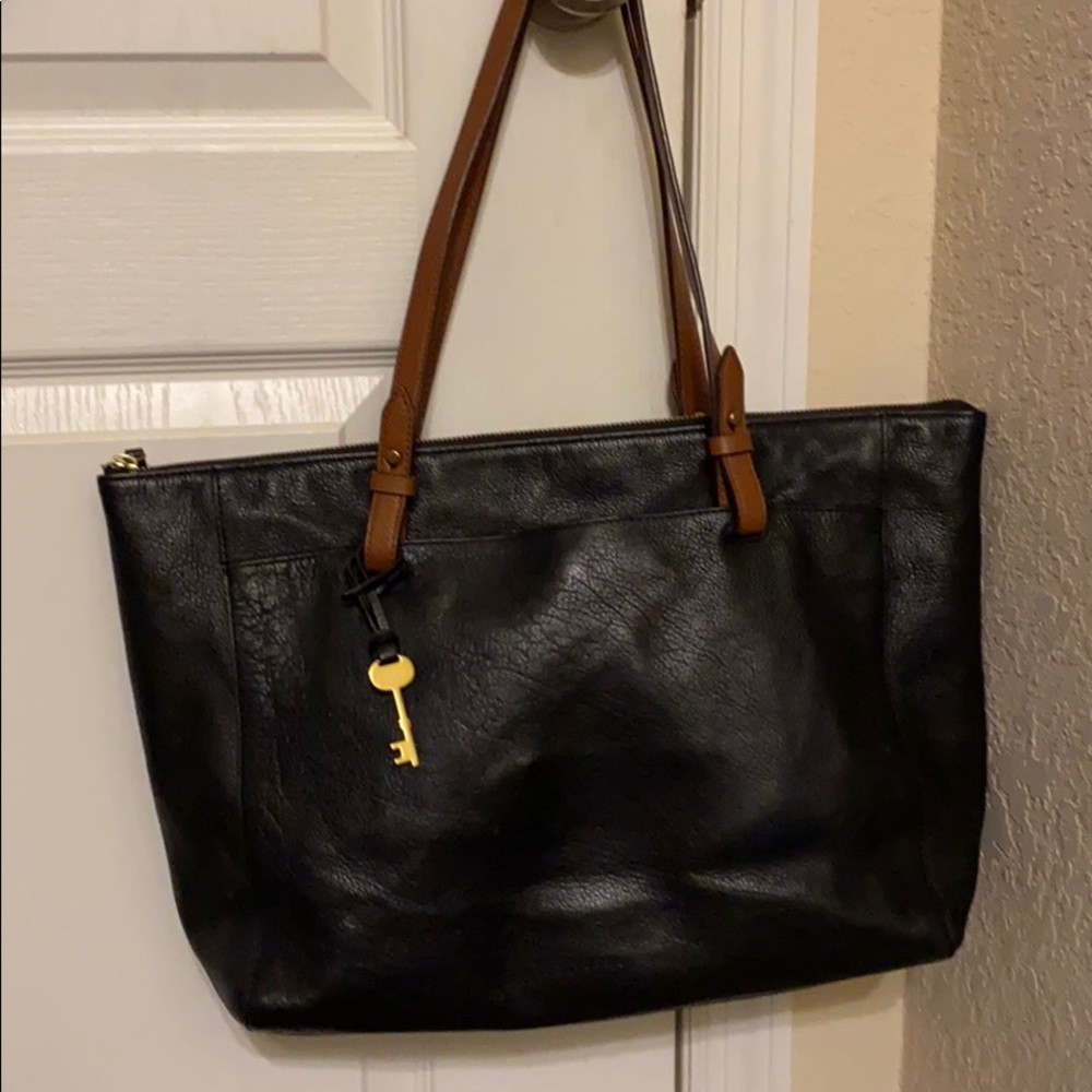 Fossil shoulder tote bag.  Black and brown leather